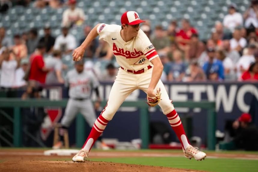 Wearing an Angels City Connect uniform, Herget prepares to release the ball.